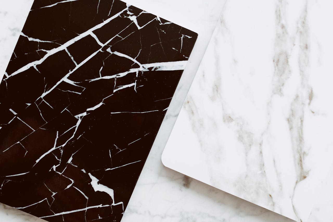 Stylish black and white marble tiles with a sleek, minimalist design, perfect for interior decor.